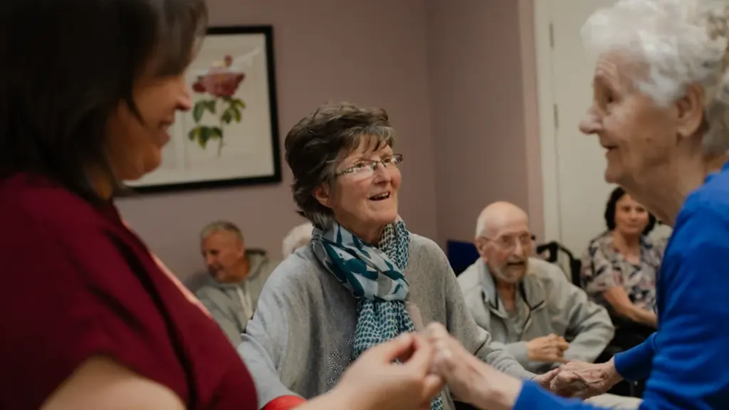 Older adults participating in an engaging and social workshop activity indoors.