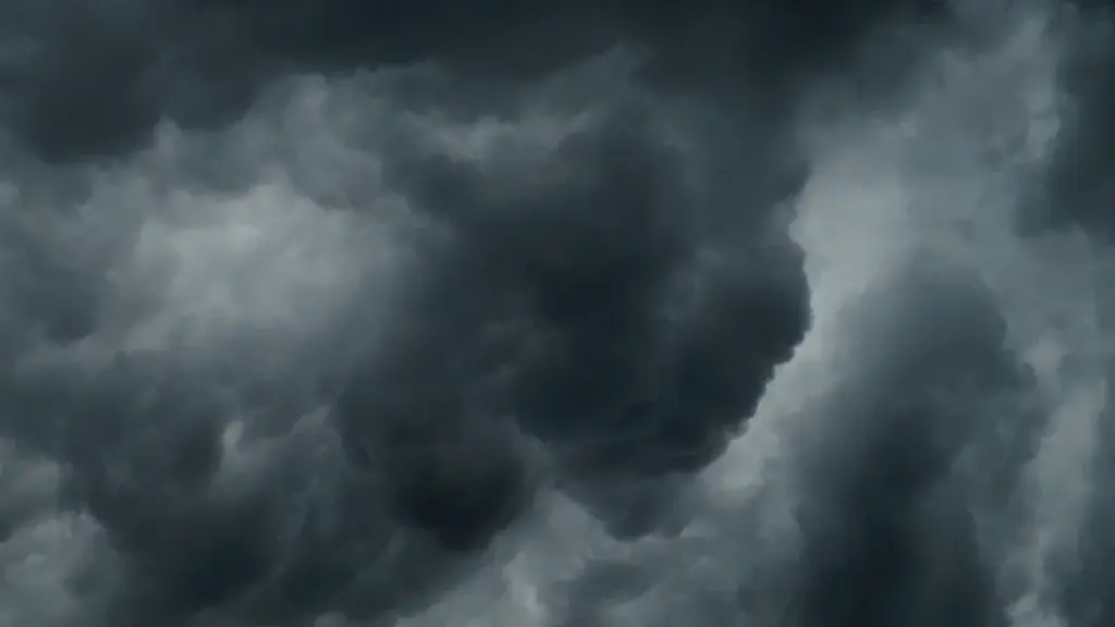 Dark, ominous storm clouds gathering in the sky above the UK.